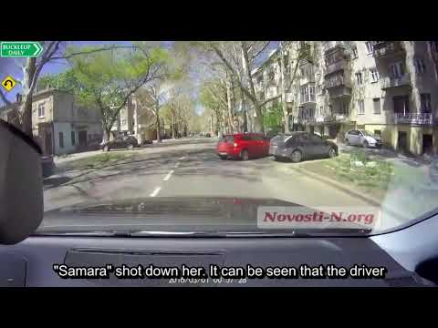 Girl running across the street cartwheels after getting hit by a car