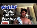 Young hunk flexing in tight tshirt