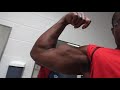 flexing arms after a killer workout (ROAD TO A BODYBUILDING show)
