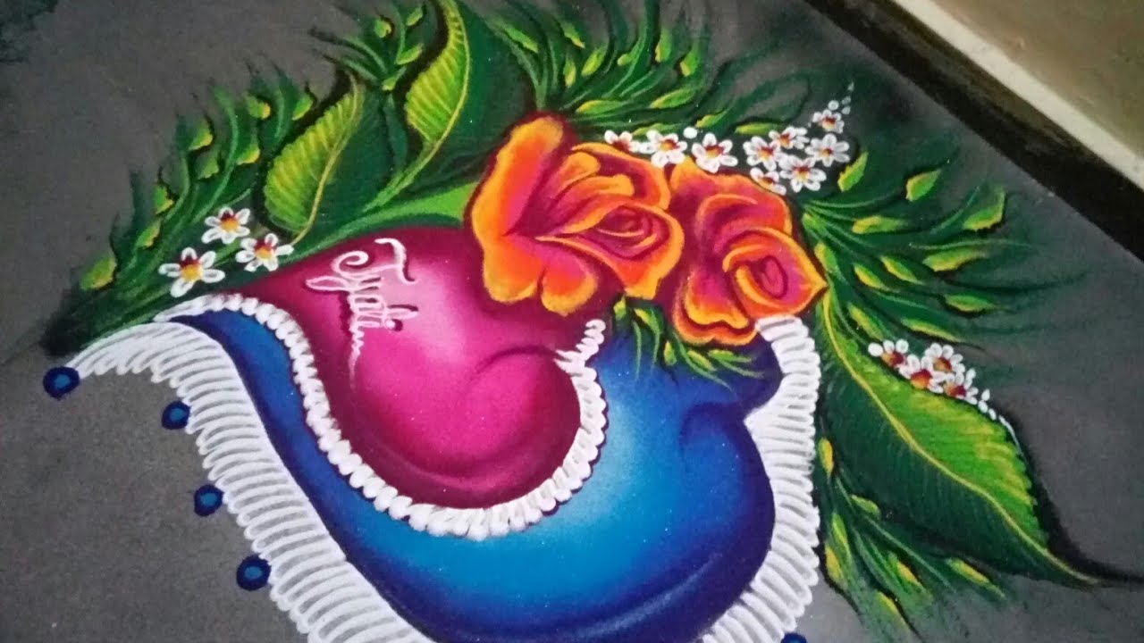 Wedding rangoli design heart shape by jyoti creative art