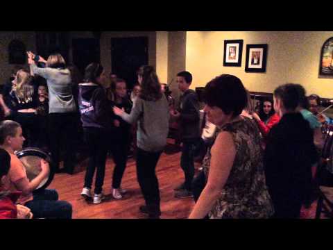 Trad Youth Exchange musicians enjoy ceili dancing at Harrington's