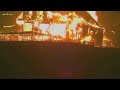Homes destroyed, smoldering because of the Bear Fire