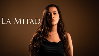 La Mitad Lyrics English Translation