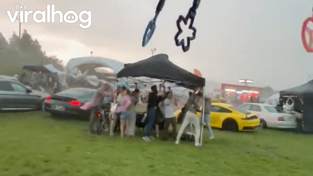 Tsunami Hits Car Show in Russia || ViralHog
