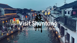 With Pandaland Villager . . . Visitor Guide to ShanTang River and ShanTang Street, SuZhou Overview ShanTang River and ShanTang Street, located in SuZhou, JiangSu Province, are renowned for their picturesque beauty and historical significance. Often referred to as the `Venice of the East,` ShanTang Street is a perfect blend of traditional Chinese architecture, serene waterways, and vibrant local culture, making it a must-visit destination. Historical Background of ShanTang River ShanTang River, also known as the `Seven-Li Shantang,` was originally constructed in 825 AD during the Tang Dynasty. The construction was overseen by Bai Juyi, a renowned poet and the then governor of SuZhou. The canal was built to connect SuZhou city with HuQiu (Tiger Hill), facilitating trade and transportation while providing a scenic route for travelers. The project was an ambitious undertaking aimed at promoting economic development and improving water management in the region. The construction of the canal also helped to control flooding and provided a reliable source of water for irrigation, which was crucial for local agriculture. Over the centuries, ShanTang River became a vital artery for the transportation of goods and people. It also served as a cultural hub, with the development of markets, temples, and residential areas along its banks. The river and the adjacent ShanTang Street became synonymous with prosperity and cultural richness, attracting scholars, merchants, and artists who contributed to the flourishing of SuZhou. Getting There By Air: The nearest airport is SuZhou Sunan Shuofang International Airport (WUX), located about 40 kilometers from the city center. From the airport, you can take a taxi or a shuttle bus to reach ShanTang Street. By Train: SuZhou Railway Station is well-connected with major cities like Shanghai, HangZhou, and Nanjing. From the station, you can take a local bus or taxi to reach ShanTang Street. By Bus: SuZhou is well-served by long-distance buses from nearby cities. The main bus station in SuZhou is SuZhou North Bus Station, from where you can take a local bus or taxi to ShanTang Street. Getting Around Walking: The best way to explore ShanTang Street is on foot, allowing you to fully appreciate the historical buildings, quaint shops, and beautiful scenery. Boating: Taking a boat ride along the ShanTang River offers a unique perspective of the ancient town and its waterways. Local Transport: Taxis and local buses are available for traveling to and from different parts of SuZhou. Main Attractions ShanTang Street This ancient street, with a history of over 1,100 years, stretches for about 3. 5 kilometers along the ShanTang River. It is lined with well-preserved traditional buildings, charming shops, tea houses, and restaurants, offering a delightful walking experience. ShanTang River The ShanTang River is a scenic waterway that flows through the heart of the town. Boat rides along the river provide a tranquil and picturesque journey, showcasing the town`s beautiful bridges, ancient buildings, and lush gardens. Pingjiang Road Located nearby, Pingjiang Road is another historic street that complements your visit to ShanTang Street. Known for its classical SuZhou gardens, traditional houses, and cultural sites, it offers a deeper understanding of SuZhou`s rich heritage. Baosheng Temple Baosheng Temple, located along ShanTang Street, is a historic Buddhist temple with beautiful architecture and serene gardens. It provides a peaceful retreat and a glimpse into the town`s religious heritage. Tiger Hill Just a short distance from ShanTang Street, Tiger Hill is a popular tourist attraction known for its natural beauty, historical sites, and the iconic Yunyan Pagoda, often referred to as the `Leaning Tower of China. ` Local Cuisine SuZhou`s cuisine is known for its delicate flavors and emphasis on fresh, seasonal ingredients. Here are some must-try dishes: Sweet and Sour Mandarin Fish: A signature dish of SuZhou, featuring fresh fish cooked in a sweet and tangy sauce. Squirrel-Shaped Mandarin Fish: A beautifully presented dish with a crispy exterior and tender meat, often served with a sweet and sour sauce. SuZhou Noodles: Hand-pulled noodles served in a rich broth with various toppings, including pork, shrimp, and vegetables. Local Pastries: Try the traditional SuZhou-style mooncakes and other pastries filled with sweet or savory ingredients. Shopping Local Handicrafts: ShanTang Street is famous for its traditional handicrafts, including silk products, embroidery, and paper-cutting. These items make for unique souvenirs. Antique Shops: Explore local antique shops for historical artifacts, vintage items, and collectibles. Tea Houses: Purchase high-quality Chinese tea from the local tea houses along ShanTang Street. Accommodation Traditional Inns: For an authentic experience, consider staying in a traditional inn or guesthouse, which often feature historical architecture and local decor. Mid-Range Hotels: Options such as the SuZhou Garden Hotel and local boutique hotels provide comfortable accommodations at reasonable prices. Luxury Hotels: For a high-end stay, consider hotels like the SuZhou Marriott Hotel or the SuZhou Jinji Lake Grand Hotel, both offering excellent amenities and service. Tips for Visitors Best Time to Visit: The best times to visit ShanTang Street are spring (April to June) and autumn (September to November) when the weather is mild and pleasant. Clothing: Wear comfortable walking shoes and dress in layers to accommodate changing temperatures. An umbrella or raincoat is useful during the rainy season. Respect Local Customs: Be respectful of local customs and traditions. Dress modestly and be mindful of local etiquette, especially when visiting historical and cultural sites. Language: While Mandarin is widely spoken, learning a few basic phrases or using a translation app can be very helpful. Plan Your Visit: ShanTang Street is best explored at a leisurely pace. Take your time to wander through the streets, visit local shops, and enjoy the tranquil atmosphere. Conclusion ShanTang River and ShanTang Street, with their rich history, traditional architecture, and picturesque scenery, offer a unique and memorable travel experience. Whether you`re exploring ancient streets, savoring local cuisine, or taking a serene boat ride along the river, ShanTang provides an unforgettable glimpse into SuZhou`s past. Plan your visit carefully to make the most of your trip to this charming destination in JiangSu Province. The ancient ShanTang River and ShanTang Street, SuZhou, JiangSu province