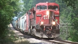 preview picture of video 'CP 8542 East, Under the CN Tracks at Genoa on 7-15-2012'