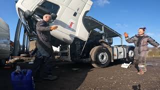 Female Diesel Mechanic Changing cab tilt pump, air dryer filter and air filter Volvo FH 16/2/22