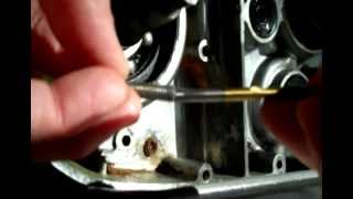 Using a left hand drill bit to remove a buggered screw