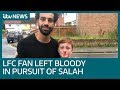 Liverpool fan meets hero Mo Salah after running into lamppost | ITV News