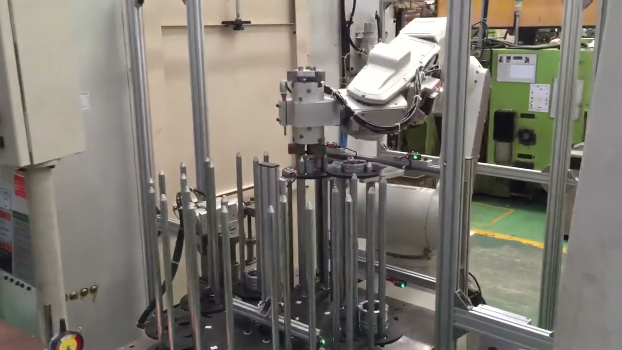 Robot with stocker design for 2 m c of Machining Center by Thai Rokuha