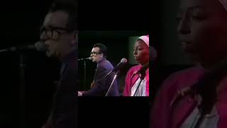 "Charm School", performed by Elvis Costello and the Attractions, with Afrodiziak.