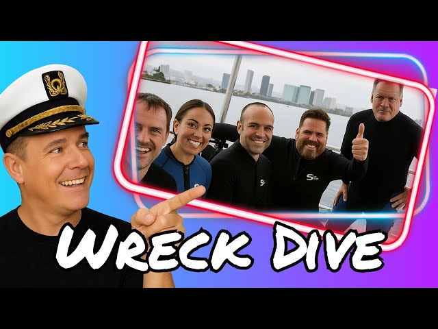 The group of scuba divers descending toward the bow of the Sea Tiger shipwreck in Honolulu.