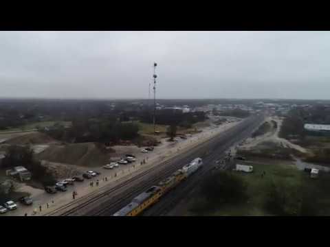 A special funeral train carries the casket of former President George H.W. Bush a final stop near his burial site in Texas. The blue and gray locomotive was painted to resemble Air Force One. (Dec. 7)
