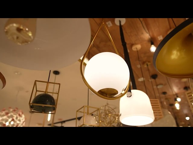 Modern relationship chandelier in the shape of a golden drop