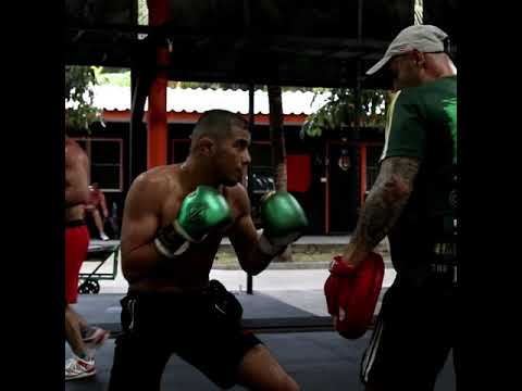 Muhammad Mokaev and Magomed Kurbanov working with boxing coach John Hutchinson