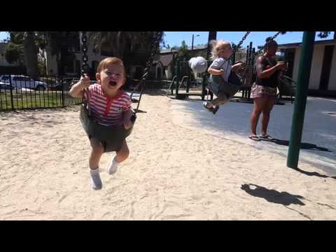 Ian with Tia Crystal on the swings