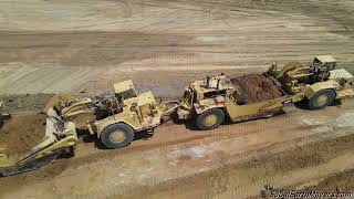 CAT 657G Coal Haulers playing in the dirt