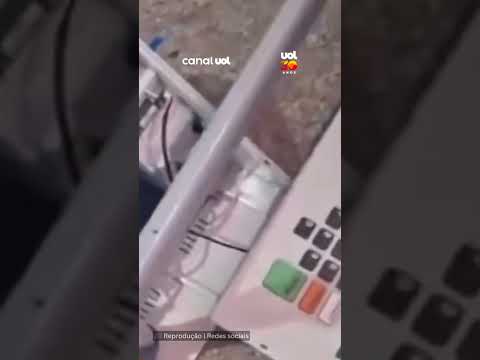 Eleitor joga urna no chão em local de votação em Fortaleza (CE)