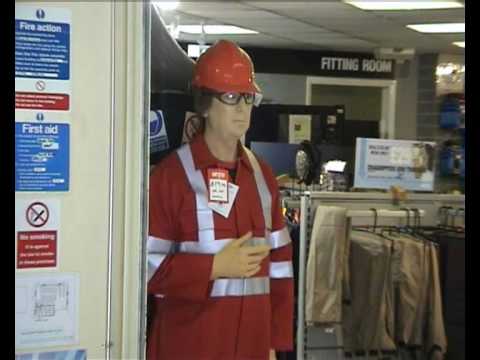 Living Mannequin Arco Event Day Watford mannequin-man performming as a Living Mannequin: Promotional day at Arco shop in Watford. There was already a mannequin in a display, standing on a step ladder, with its head and arm in the roof, as if mending something; so mannequin man took the display mannequin's place. for Arco on 27/05/2010