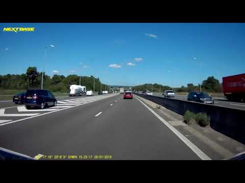 M25 Junction 5 car crossing chevrons