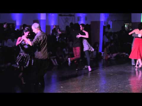  Víctor Barrios  and  Cristina Benavidez  are  dancing  to  a  tango  at  Rosario Tango Festival  in  2015