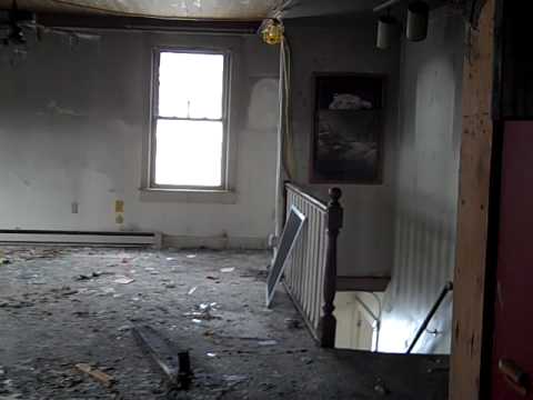 Fire Water Damage Restoration Company Inspecting a Damaged Home.AVI