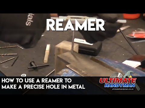 How to use a reamer to make a precise hole in metal