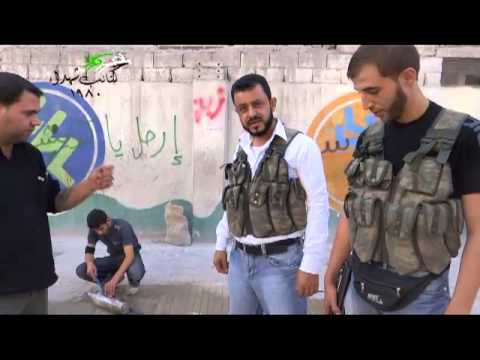 لقاء مع مقاتلي كتائب شهداء 1980 أثناء عملية تجهيز ألغام محلية الصنع في مدينة حلب