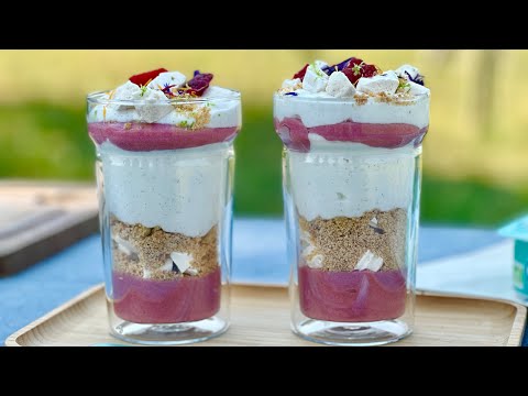 White cheese mousse verrines with raspberry coulis