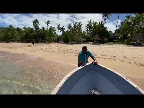 Fiji - In order to change a hotel, the guests are getting on a boat which brings them to a catamaran