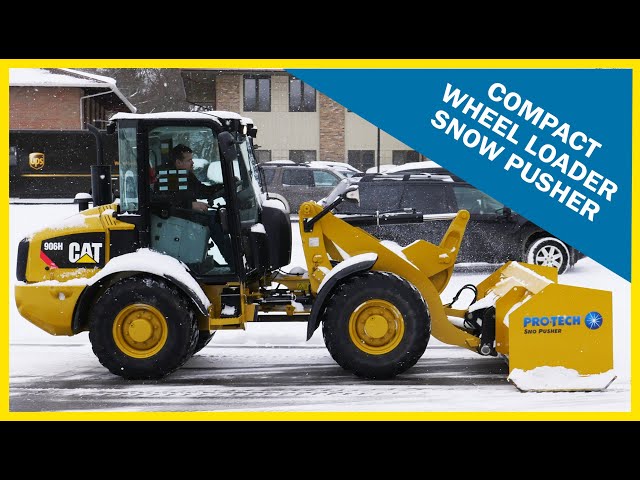 Compact Wheel Loader Sno Pusher in Action