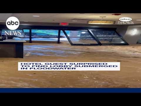 Hotel guest surprised to find lobby submerged in floodwater