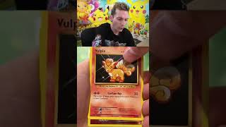 HE PULLED THE CHARIZARD CARD LIVE 🔥