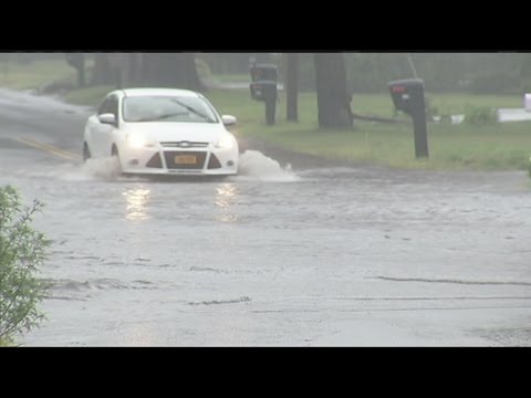 Heavy rain floods the streets of Agawam