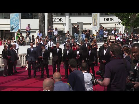 Cannes: Cast and crew of "Boy from Heaven" by Tarik Saleh on the red carpet | AFP