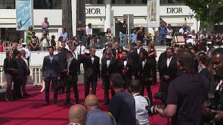 Cannes: Cast and crew of "Boy from Heaven" by Tarik Saleh on the red carpet | AFP