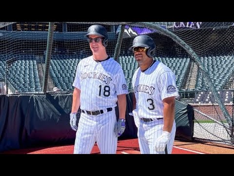 Peyton Manning and Russell Wilson take batting practice with the Rockies ⚾