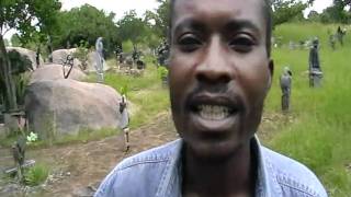 preview picture of video 'Munyaradzi Fombe and his sculpture at Chitungwiza Zimbabwe'