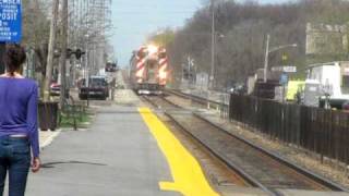 preview picture of video 'Metra #2134 Arriving at Morton Grove, IL  (Long zoom!)'