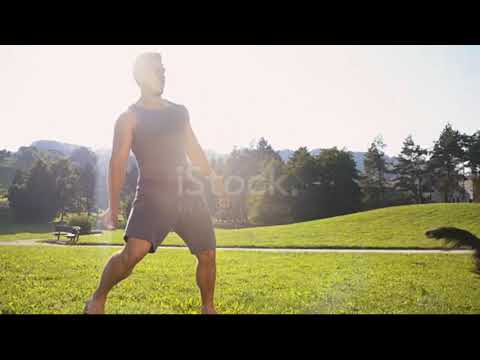 #short | Slo Mo Young Man Training His Dog Catching A Ball Stock Video - Download Video | funny