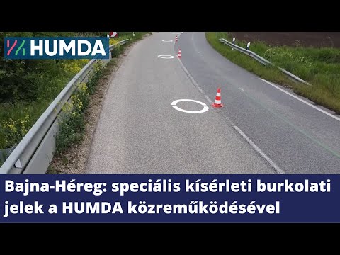 Bajna-Héreg: speciális kísérleti burkolati jelek a HUMDA közreműködésével
