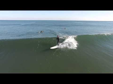 Drone footage of Asbury Park and its surfers