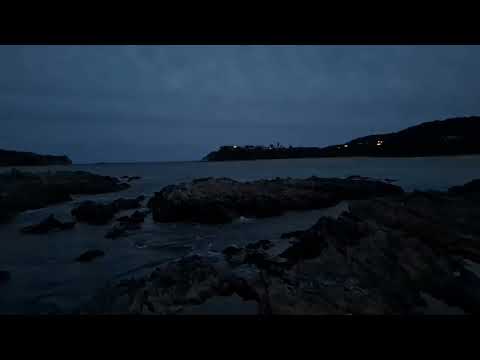 The lighthouse in Burrewarra Point shines on and off