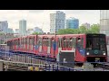 Docklands Light Railway DLR Train Services Arriving Into Canary Wharf Station 8 6 2024