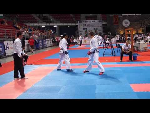 Evgeny Otsimikv v Alisher Akhmedov (Taj) -57kg Male Sparring Semi. ITF World Championships 2013