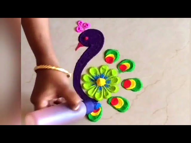 Beautiful peacock rangoli by fun with rangoli