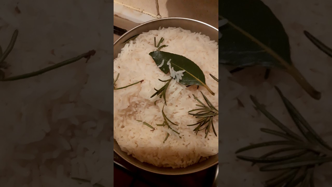 Chicken breast stir fried in bamboo shoots and chestnuts with vegetables and rice cooked in herbs