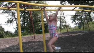 preview picture of video 'Macie E climbs the Monkey Bars at Amor Park'