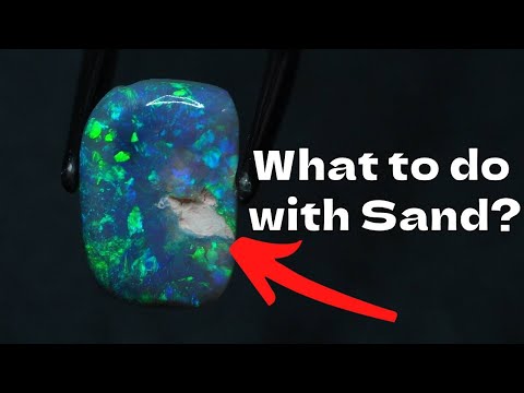 Sand in ROUGH OPAL, what should you do?