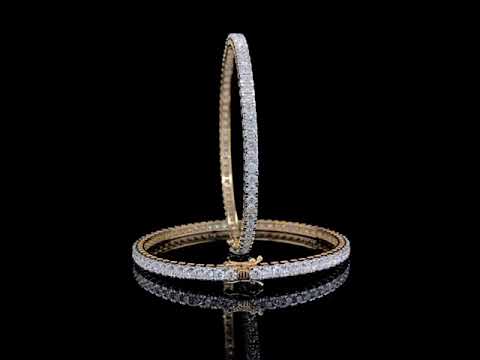 GOLD BANGLE WITH NATURAL DIAMONDS